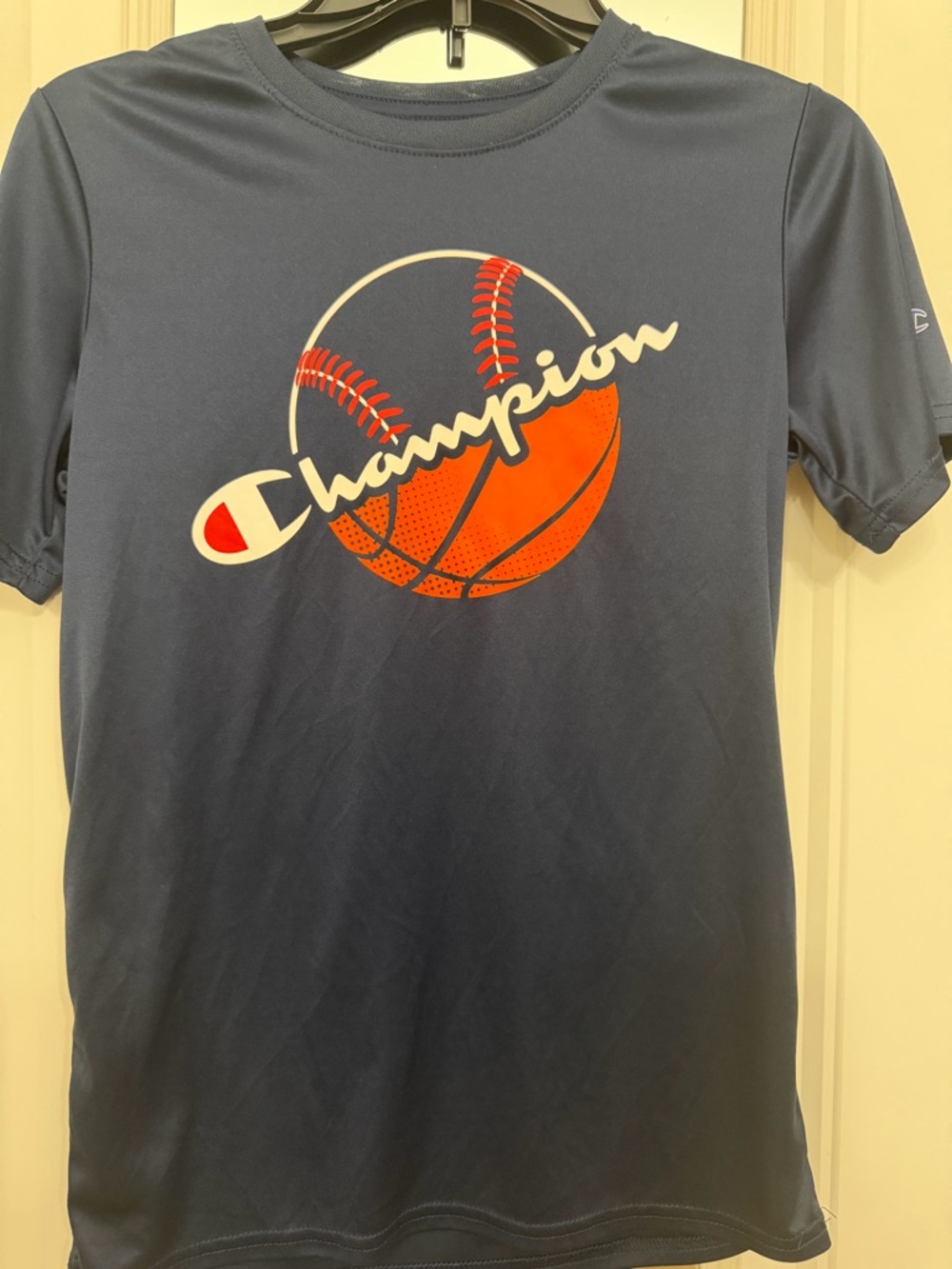 Champion Navy Tee with Orange and White Sports Graphic